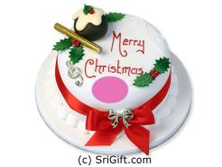 A delightful Christmas themed cake in the shape of a wreath. Weight: 2 Kg.