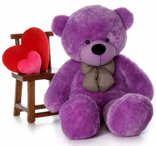 teddy bear with purple bow tie